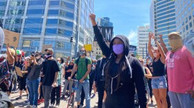 A protester giving the black power salute in downtown San Diego on May 31, 2020, during a demonstration against recent police brutality against blacks.