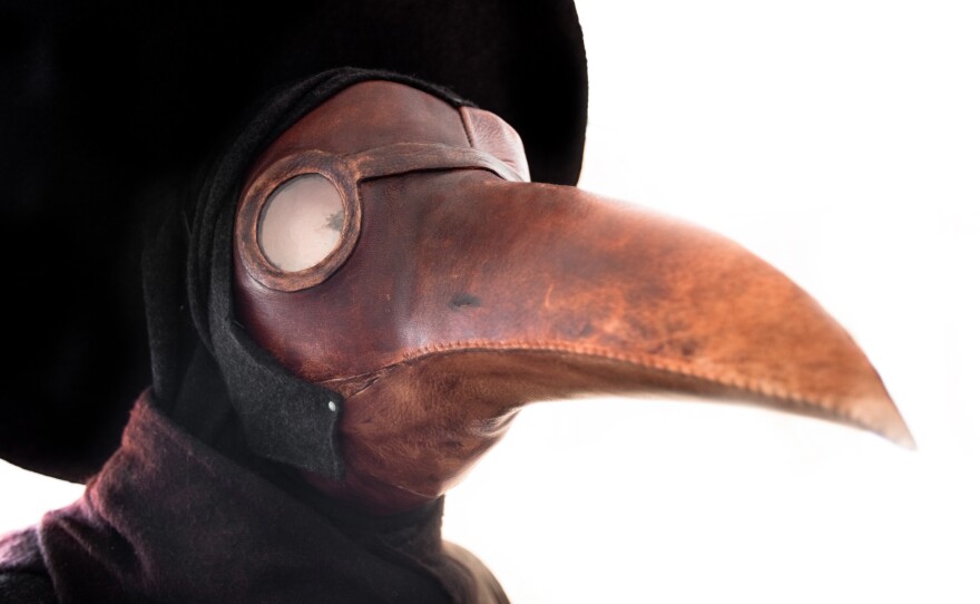Plague doctors in the 1600s wore birdlike masks like these, which were thought to protect against disease.