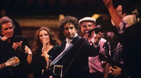 Bob Dylan (center) surrounded by some of the greatest names in popular music. GREAT PERFORMANCES presents an encore of highlights from 1992’s star-studded concert tribute to pop music icon Bob Dylan at Madison Square Garden.