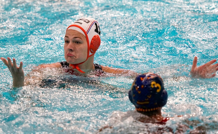 Netherland's Simone van de Kraats reacts to an official's call during a preliminary round women's water polo match against Spain at the 2020 Summer Olympics, Wednesday, July 28, 2021, in Tokyo, Japan.