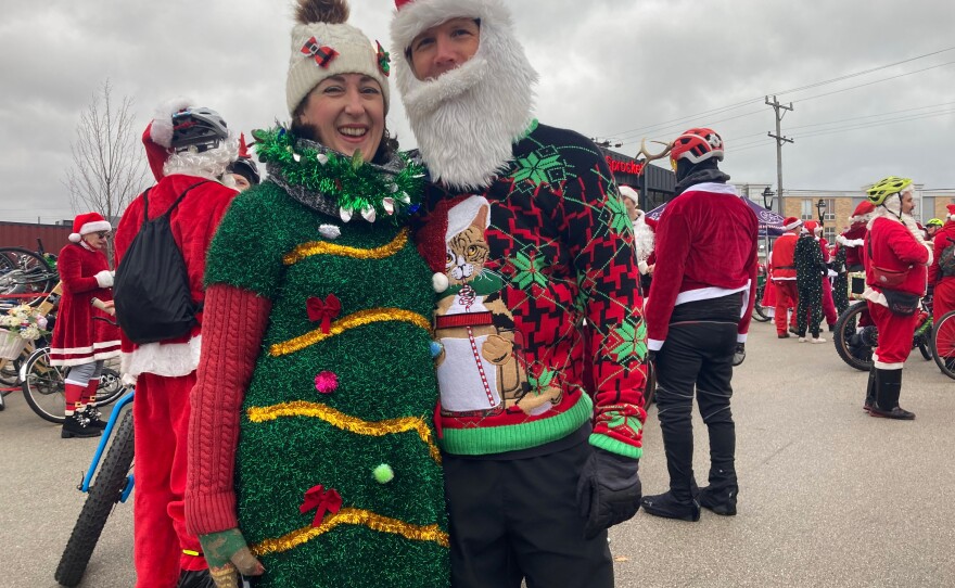 Sherry (left) and Tyler Steward (right) smile before the start of the rampage. Both avid cyclists, the Stewards said it was a thrill to take over the streets.