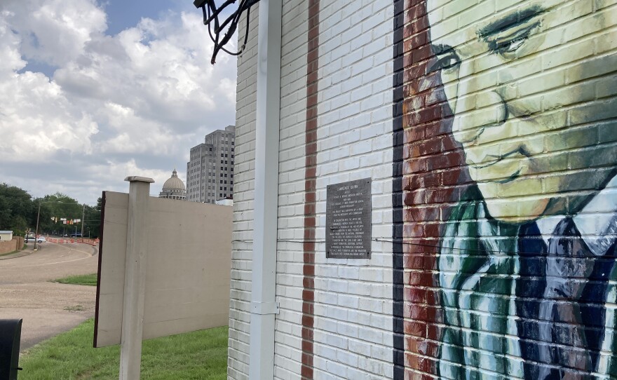 A mural of writer Richard Wright is painted on the wall of the Smith Robertson Museum, a few blocks from the Mississippi State Capitol.