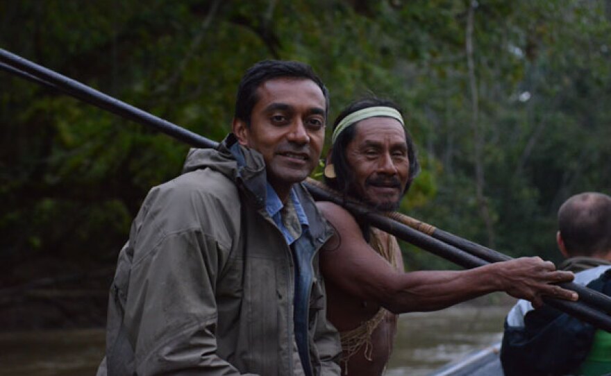 M. Sanjayan on boat with Waorani.