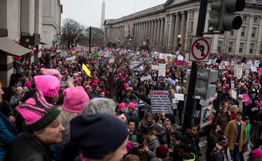 Protesters march near the U.S. Department of the Treasury.