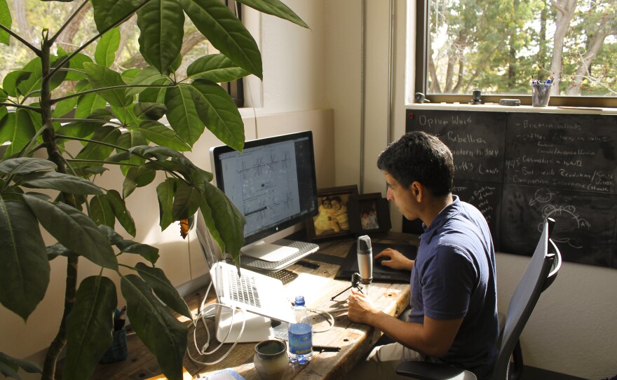 Sal Khan works at his office in Mountain View, Calif. He still starts the day making video tutorials, which he's done for a decade, for his online academy.