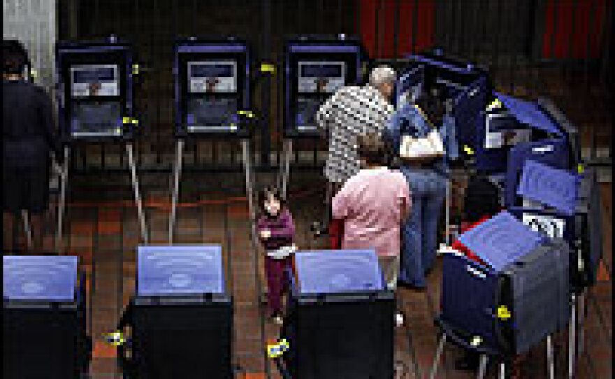 Florida voters cast their ballots with touch-screen voting machines for the Jan. 29 primary, but many counties are turning back to paper ballots for the November election.