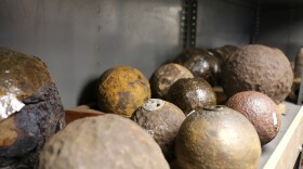A row of recovered cannonballs in the Charleston Museum.