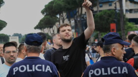 Police officers block a street during a demonstration in Tirana, Albania, Wednesday, June 3, 2026, opposing a luxury coastal development project linked to Jared Kushner and Ivanka Trump over concerns about environmental impacts and transparency.