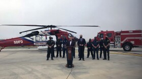 Councilmember Chris Cate, Mayor Kevin Faulconer and San Diego Fire Chief Colin Stowell at a press conference to stress the importance of fire preparedness as the peak fire season begins.