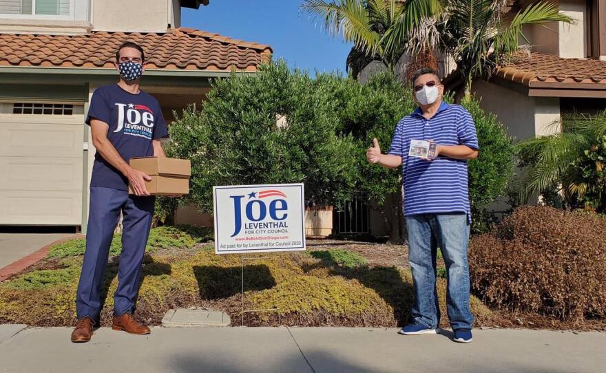 San Diego City Council candidate Joe Leventhal stands with a supporter in this undated photo.