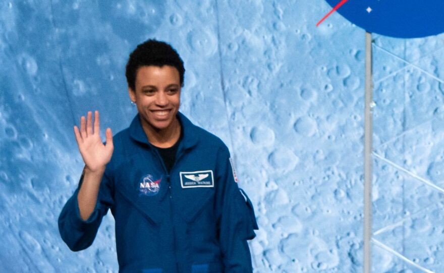 NASA astronaut Jessica Watkins waves at the audience during the astronaut graduation ceremony at Johnson Space Center in Houston Texas, on January 10, 2020.