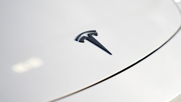 A logo for Tesla is seen on a vehicle at a Tesla facility Wednesday, April 15, 2026, in Portland, Ore.