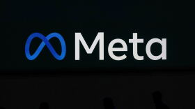 FILE - A Meta logo is shown on a video screen at LlamaCon 2025, an AI developer conference, in Menlo Park, Calif., April 29, 2025.