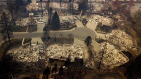 Residences leveled by the Camp Fire line a cul-de-sac in Paradise, Calif., Nov. 2018.