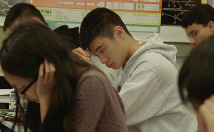 Jonathan Chu takes exam.