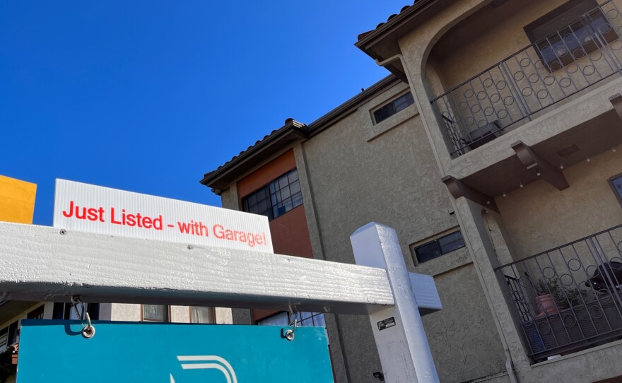 A "for sale" sign in front of a condo in the Golden Hill neighborhood of San Diego, Calif. Dec. 7, 2022.
