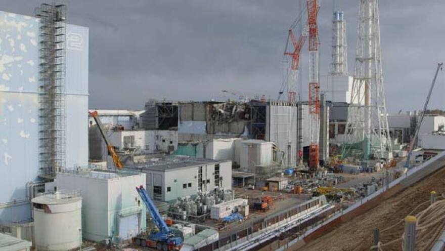 Wide shot of damaged reactor, Fukushima Daiichi Nuclear Power Station.