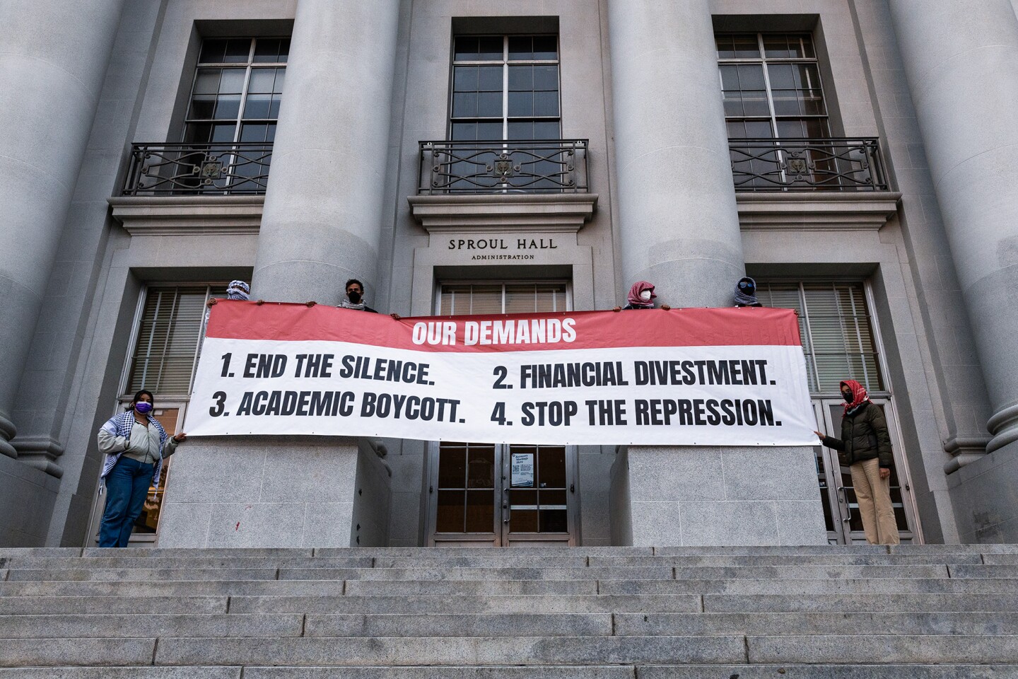 A sign with students' demands at the “Free Palestine Camp” outside of Sproul Hall at UC Berkeley on April 23, 2024.