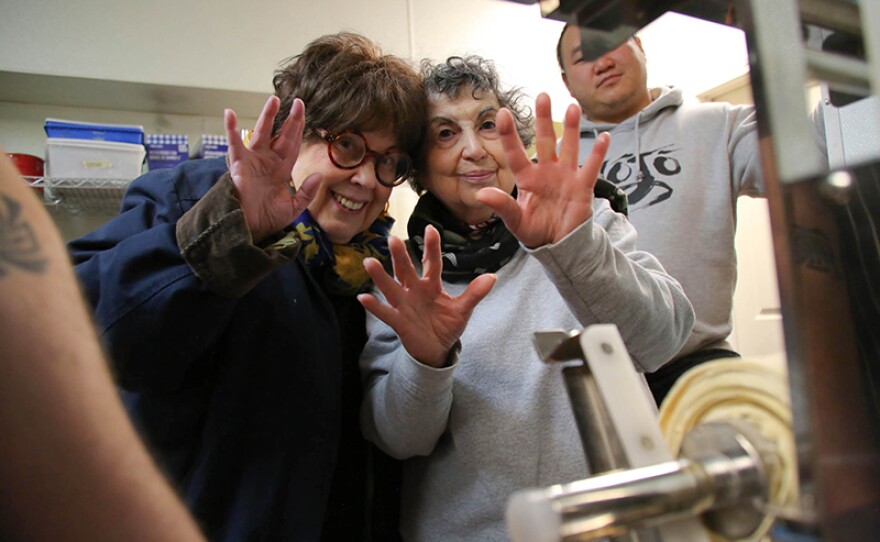The Brass sisters flirting to the camera at Shojo Kitchen in Boston, Mass.