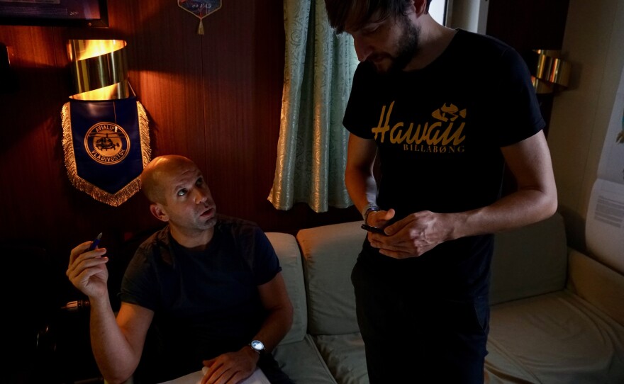 Thomas Krumpen, co-cruise leader of the Akademik Fedorov (left), with modeler Thomas Rackow after a meeting about ice conditions.