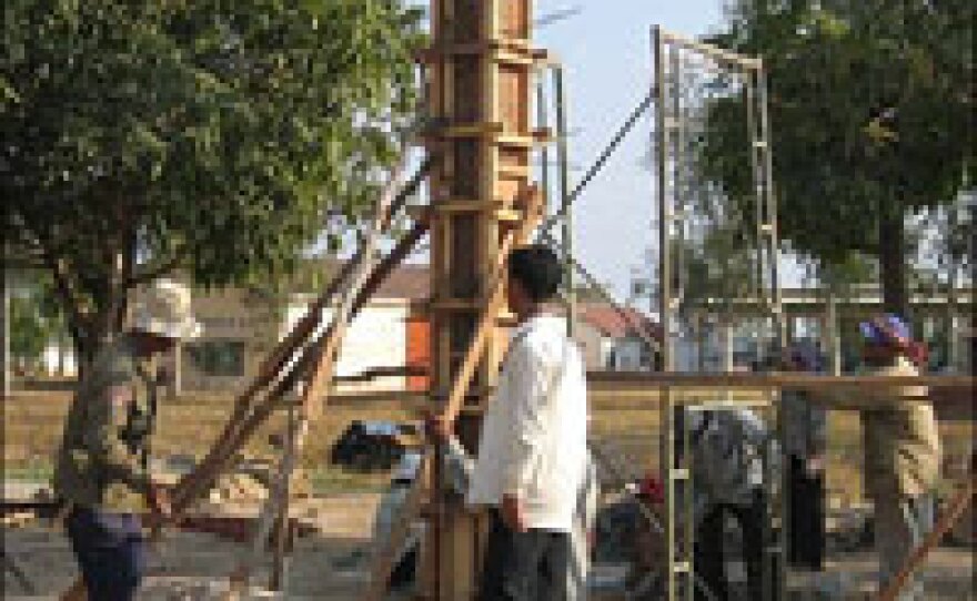 Construction crews work on a detention center that will house some of the accused when and if the Khmer Rouge Tribunal begins.