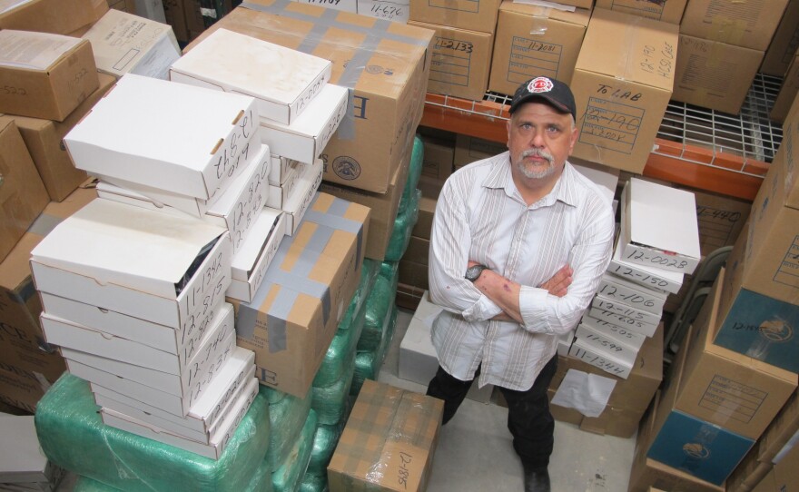 Rusty Fleming, spokesman for the Hudspeth County Sheriff's Office in Sierra Blanca, Texas, stands in an evidence room where bundles of marijuana seized at the nearby U.S. Border Patrol checkpoint fill the entire building with the smell of pot.