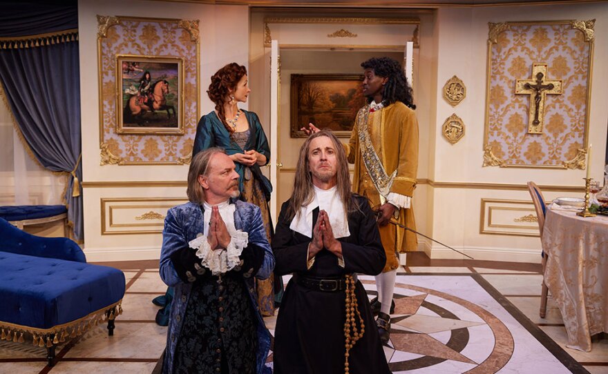 Members of the cast of North Coast Rep's production of "Tartuffe" are shown in an undated photo. Bruce Turk as Tartuffe is shown kneeling at the front right.