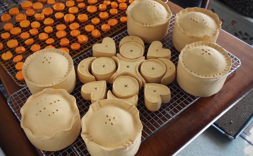 Faux carrots and mince pies await their finishing touches.