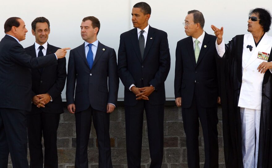 The Nobel Committee recognized President Obama for his efforts to change the tenor abroad. Here, Italian Prime Minister Silvio Berlusconi, French President Nicolas Sarkozy, Russian President Dmitri Medvedev, U.S. President Barack Obama, UN Secretary General Ban ki Moon, Libyan Leader Muammar Gaddafi and the extended members of the G8 world leaders pose for a "family photo" on the third day of the G8 summit on July 10, 2009.