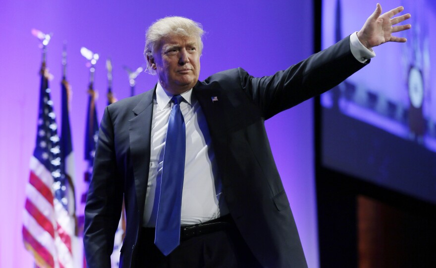 Donald Trump waves as he walks offstage after speaking at the Iowa Republican Party's Lincoln Dinner last month.