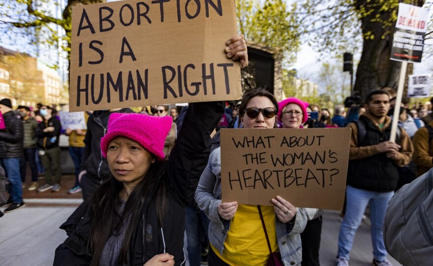 <strong>BOSTON</strong>: Kha Dickerman, left, joined thousands of others to rally to defend abortion rights at the Massachusetts State House.