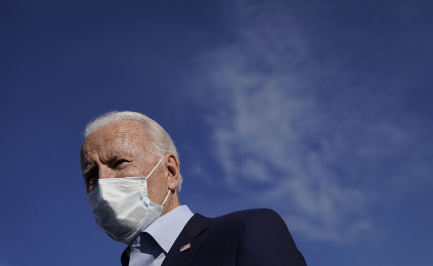 Democratic presidential nominee and former Vice President Joe Biden speaks to reporters before boarding his campaign plane at Duluth International Airport on September 18, 2020 in Duluth, Minn.
