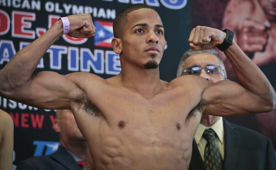 Puerto Rican boxer Felix Verdejo, seen posing before a fight in 2016, allegedly punched his 27-year-old lover in the face, drugged her, then restrained her arms and legs before shooting her and dumping her into a river.