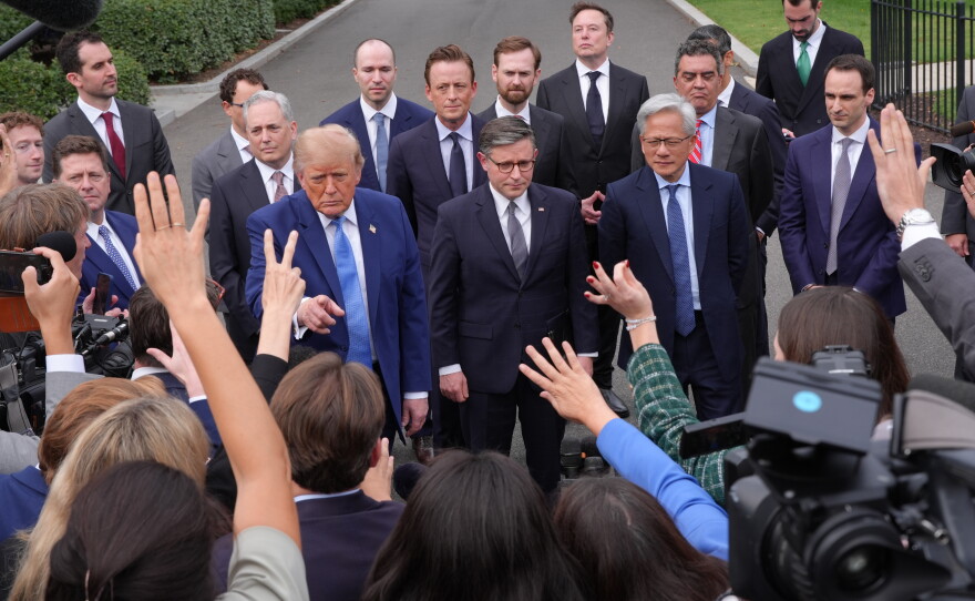 President Donald Trump speaks to reporters at the White House in Washington, Tuesday Sept. 29, 2026, after meeting with top executives of AI firms, as House Speaker Mike Johnson of La., and NVIDIA CEO Jensen Huang listen.