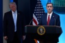 FILE - CIA Director John Ratcliffe, accompanied by President Donald Trump, speaks with reporters in the James Brady Press Briefing Room at the White House in Washington, April 6, 2026.