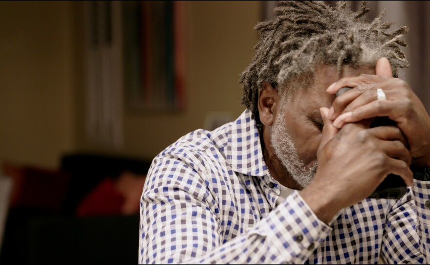 In 2020, Jacobs was denied a hearing to reduce his prison sentence. His father, pictured here, grapples with the news while trying to comfort his son.
