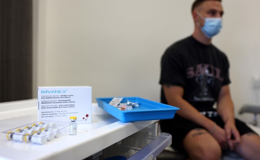 A man receives a vaccination dose against monkeypox in London, England. The vaccines, which are designed to prevent smallpox, also provide protection against monkeypox, which is from the same viral family.