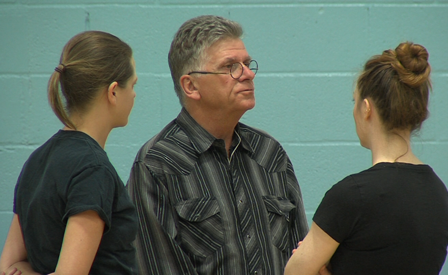 Fern Street Circus co-founder John Highkin talks to after-school program coaches at the Mid-City Gym in City Heights, Jan. 30, 2018.