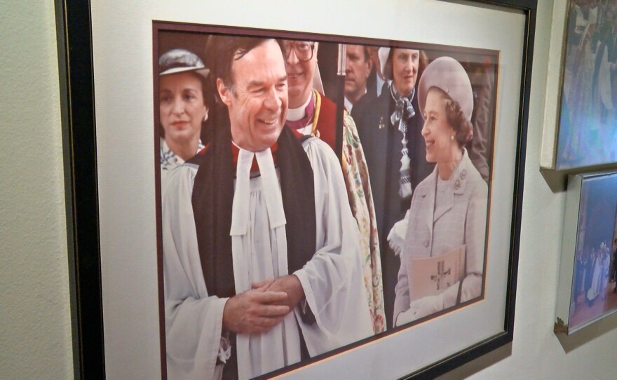 A picture showing Queen Elizabeth with the Rev. James Carroll is shown at the Carroll home.