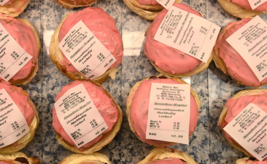 Doughnuts with a receipt made of fondant were on display last week at a bakery in Moosinning, Germany. These Kassenbon Krapfen — receipt doughnuts — are a reaction to Germany's new receipt law.