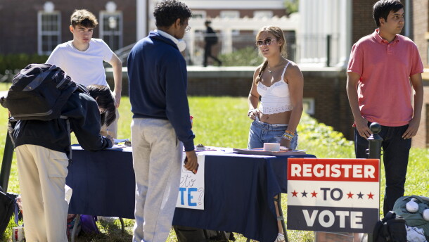 Students at the University of Virginia help eligible voters register to vote in Charlottesville, Va., in 2024.