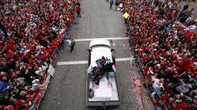 <p>St. Louis Cardinals first baseman Albert Pujols, top right, waves to fans during a victory parade on in St. Louis, after the Cardinals defeated the Texas Rangers to win their 11th baseball World Series in franchise history. </p>