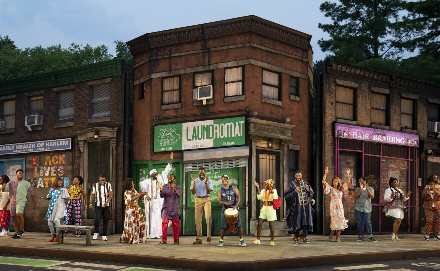 The company of the Free Shakespeare in the Park production of <em>Merry Wives,</em> adapted by Jocelyn Bioh and directed by Saheem Ali, running at The Delacorte Theater in Central Park through September 18.