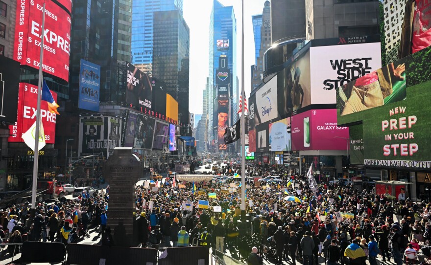 Hundreds of people gather for a "Stand With Ukraine" rally in Times Square on Saturday in New York City. Ukrainians, Ukrainian Americans and allies gathered to show support for Ukraine and protest against the Russian invasion.