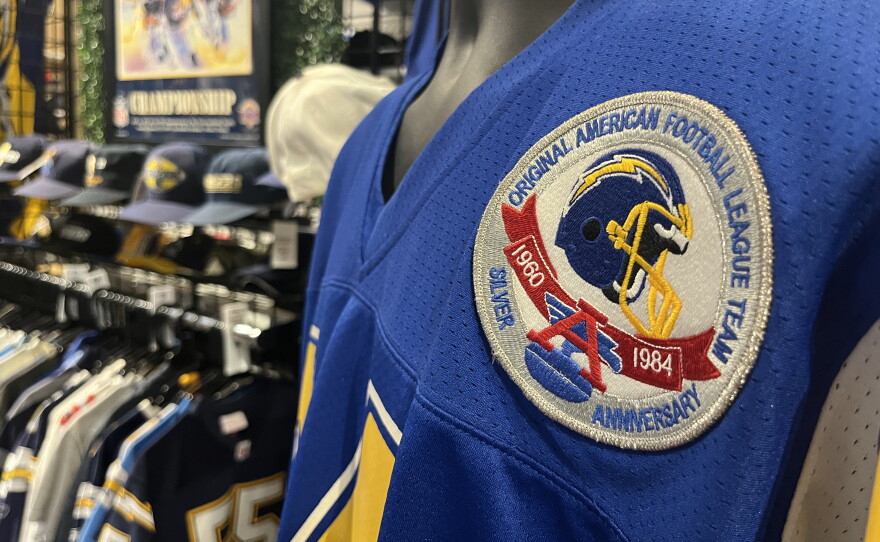 A classic Chargers jersey hangs on a mannequin at J-Fitters brick and mortar store in Escondido, Aug. 6, 2026.