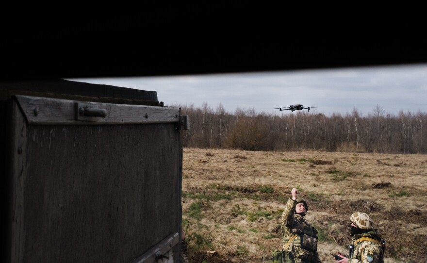 Soldiers practice with drones in western Ukraine.