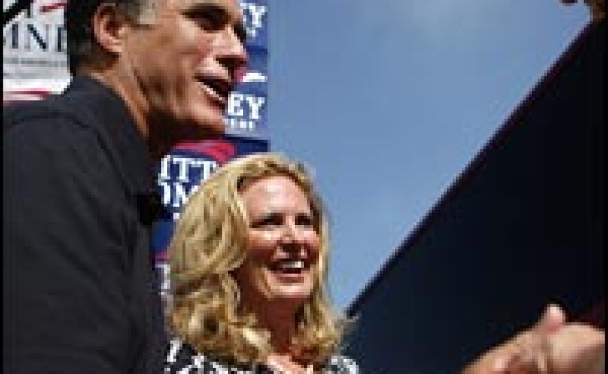 Republican presidential candidate former Mitt Romney and his wife Ann greet voters at the Iowa Straw Poll, Aug. 11, 2007, in Ames, Iowa.