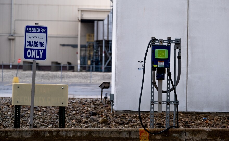 A vehicle charging station is seen in the parking lot of the Lordstown Motors vehicle body facility.