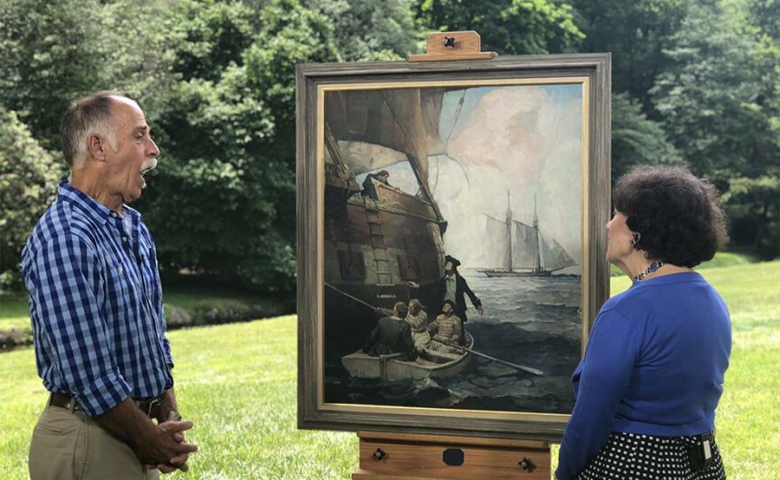 Debra Force (right) appraises a 1923 Frank Schoonover oil painting