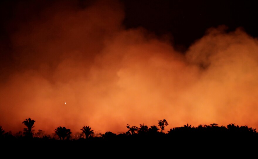 Smoke billows during a fire in an area of the Amazon rainforest near Humaita, Brazil, on Aug. 17.
